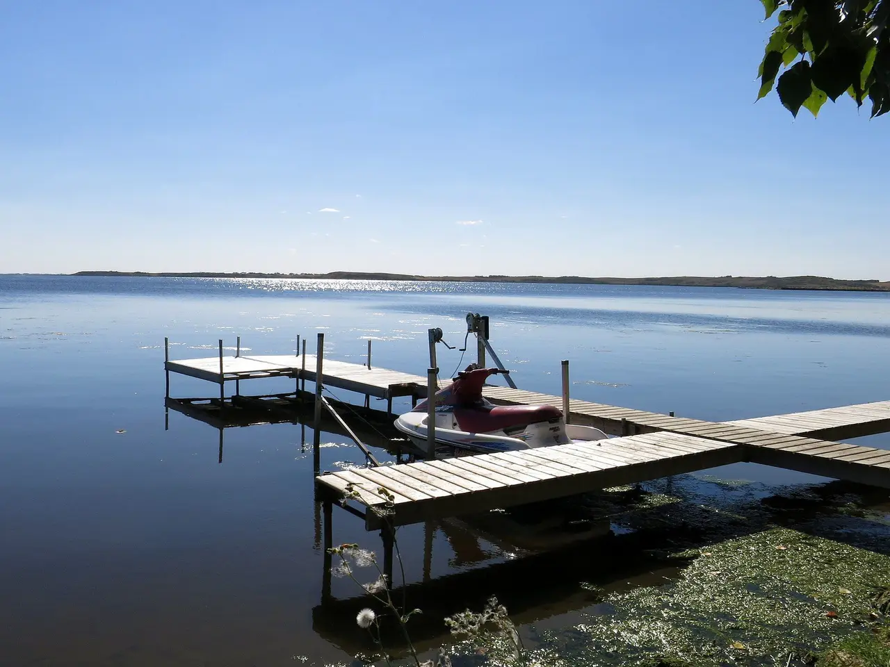 Dock and watercraft on Jackfish Lake, 2013